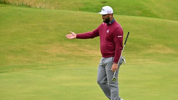 Spain's Jon Rahm reacts to his missed putt on the 18th green on day two of the 153rd Open Championship at Royal Portrush golf club in Northern Ireland on July 18, 2025. (Photo by ANDY BUCHANAN / AFP) / RESTRICTED TO EDITORIAL USE
