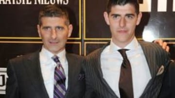 Courtois, con su padre.