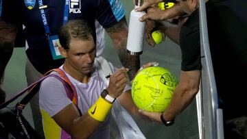 MASON, OHIO - AUGUST 17: Rafael Nadal of Spain signs autographs for fans after losing his match to Borna Coric of Croatia 7-6, 4-6, 6-3 during the Western & Southern Open at the Lindner Family Tennis Center on August 17, 2022 in Mason, Ohio.   Dylan Buell/Getty Images/AFP
== FOR NEWSPAPERS, INTERNET, TELCOS & TELEVISION USE ONLY ==