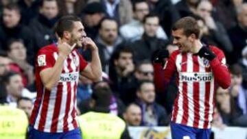 Koke y Griezmann en el partido ante el Madrid.