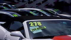 FILE PHOTO: Used cars are shown for sale at a car lot in National City, California, U.S., June 15, 2022. REUTERS/Mike Blake/File Photo