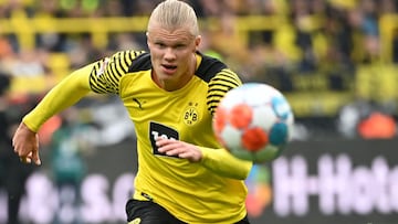 (FILES) In this file photo taken on October 16, 2021 Dortmund&#039;s Norwegian forward Erling Braut Haaland vies for the ball during the German first division Bundesliga football match BVB Borussia Dortmund v Mainz 05 in Dortmund, western Germany, on Octo