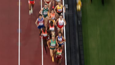 Kenya's Faith Kipyegon (bottom) leads the race as she competes in the women's 1500m final during the World Athletics Championships in Tokyo on September 16, 2025. (Photo by Antonin THUILLIER / AFP)
