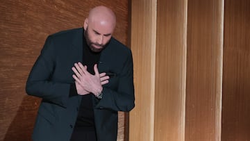 Actor John Travolta speaks at the start of the In Memoriam segment of the Oscars show at the 95th Academy Awards in Hollywood, Los Angeles, California, U.S., March 12, 2023. REUTERS/Carlos Barria