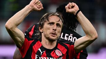 AC Milan's Croatian midfielder #14 Luka Modric celebrates his team's victory at the end of the Italian Serie A football match between AC Milan and SSC Napoli at San Siro stadium in Milan, northern Italy, on September 28, 2025. (Photo by Piero CRUCIATTI / AFP)
