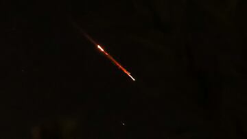 Objects are seen in the sky above Jerusalem after Iran launched drones and missiles towards Israel, in Jerusalem April 14, 2024. REUTERS/Ronen Zvulun