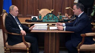 Russian President Vladimir Putin meets with Governor of Novgorod region Andrei Nikitin at the Kremlin in Moscow on March 22, 2022. (Photo by Mikhail KLIMENTYEV / SPUTNIK / AFP)