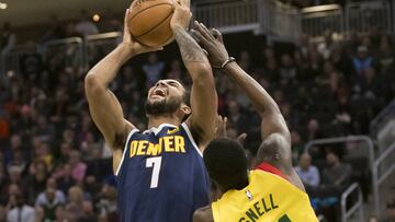Nov 19, 2018; Milwaukee, WI, USA; Denver Nuggets forward Trey Lyles (7) shoots against Milwaukee Bucks guard Tony Snell (21) during the fourth quarter at Wisconsin Entertainment and Sports Center. Mandatory Credit: Jeff Hanisch-USA TODAY Sports