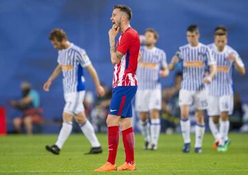 Saúl Ñíguez looks dejected as Atlético lose at Real Sociedad, all but confirming Barcelona as LaLiga champions.