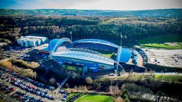 El estadio de Kirklees (también conocido como el estadio de John Smith debido al patrocinio), es un estadio de los deportes del uso múltiple en Huddersfield en Yorkshire del oeste, Inglaterra. Desde 1994, ha sido el estadio del club de fútbol Huddersfield Town y la liga de rugby de Huddersfield.

Durante la planificación y la construcción, el estadio fue referido como el estadio de Kirklees. Fue construido por Alfred McAlpine, diseñado por el deporte de HOK y fue concedido el edificio de RIBA del premio del año para 1995. La decisión de construir un nuevo estadio para Huddersfield Town se hizo en agosto de 1992. La construcción comenzó el año siguiente y se completó a tiempo para la temporada 1994-95, permitiendo al club moverse a su nueva base después de 86 años en Leeds Road. Cuando el estadio abrió sólo los dos soportes laterales (las bancas de Riverside y Kilner Bank) estaban listos. El stand del sur se abrió en diciembre de 1994. La construcción en el soporte del norte (Panasonic) comenzó en 1996 y fue terminada en 1998, trayendo la capacidad total del estadio a aproximadamente 24.500. 