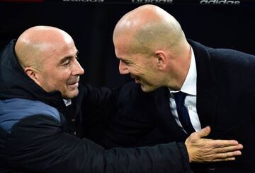 Sevilla's Argentinian coach Jorge Sampaoli and Real Madrid's French coach Zinedine Zidane before the Spanish Copa del Rey first leg.