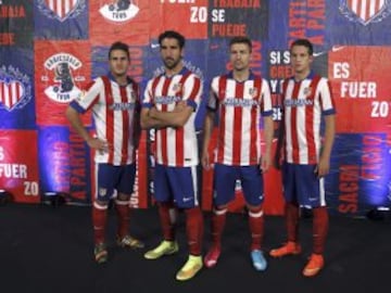 Los jugadores del Atlético de Madrid, Jorge "Koke" Resurrección, Raúl García, Gabi Fernández y Javier Manquillo, de izda a dcha, durante la presentación de la primera vestimenta que el equipo lucirá la próxima temporada.