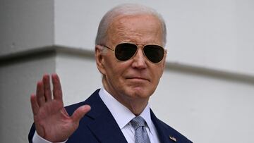 What are the general symptoms that specialists look for to rule out Biden having Parkinson’s disease?
