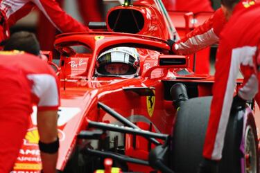 Vettel snatches pole from Raikkonen as Ferrari dominate in Shanghai