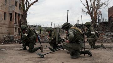 Russian service members work on demining the territory of Azovstal steel plant during Ukraine-Russia conflict in the southern port city of Mariupol, Ukraine May 22, 2022. REUTERS/Alexander Ermochenko