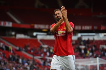 Ruud Van Nistelrooy applauds the crowd at Old Trafford