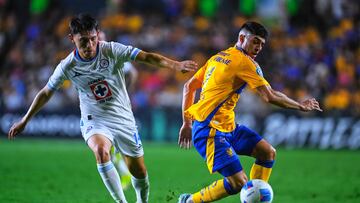 Alexis Gutierrez (L) of CruzAzul fights for the ball with Juan Brunetta (R) of Tigres during the Semi-Finals first leg match between Tigres UANL and Cruz Azul as part of the CONCACAF Champions Cup 2025, at Universitario Stadium on April 23, 2025 in Monterrey, Nuevo Leon, Mexico.