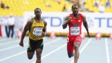 El jamaicano Nesta Carter y el estadounidense Justin Gatlin durante los Mundiales de Mosc&uacute; 2013. 