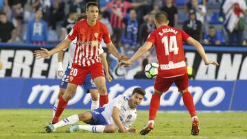Caballero y Juan Carlos Real, jugadores del Almería.