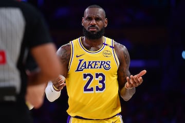 Dec 31, 2024; Los Angeles, California, USA; Los Angeles Lakers forward LeBron James (23) reacts during the first half at Crypto.com Arena. Mandatory Credit: Gary A. Vasquez-Imagn Images