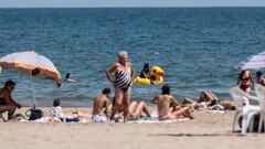 VALENCIA VALENCIAN COMMUNITY, SPAIN - AUGUST 12: Bathers enjoy themselves at the Malvarrosa Beach, on 12 August, 2022 in Valencia, Valencian Community, Spain. A DANA established in the Iberian Peninsula is causing increased temperatures in the eastern part of the country. For today the Aemet has activated the orange alert in Valencia for significant risk due to heat throughout the south of the province, while in the north will be in force the yellow alert. The worst situation will occur between one o'clock in the afternoon and nine o'clock at night, hours in which more heat is expected. Throughout the territory it is expected that the mercury will not drop below 38 ºC in the shade. (Photo By Rober Solsona/Europa Press via Getty Images)