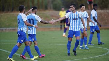 Adrián, Tete Morente y Orlando Sá, tras el gol del Málaga.
