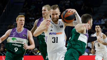 MADRID, 07/05/2023.- El ala-p¨ªvot bosnio del Real Madrid Dzanan Musa (c) durante el partido correspondiente a la jornada 31 de la Liga Endesa disputado este domingo en el Palacio de Los Deportes de Madrid. EFE/J.J. Guill¨¦n