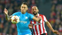 Olympique de Marseille&#039;s Argentinian midfielder Lucas Ocampos (L) vies with Athletic Bilbao&#039;s Spanish midfielder Mikel Rico during the UEFA Europa League round of sixteen second leg  football match between Athletic Club Bilbao and Olympique de M