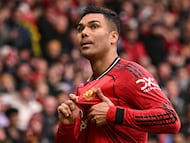 Manchester United's Brazilian midfielder #18 Casemiro celebrates after scoring the team's first goal during the English Premier League football match between Manchester United and Aston Villa at Old Trafford in Manchester, north west England, on March 15, 2026. (Photo by Oli SCARFF / AFP) / RESTRICTED TO EDITORIAL USE. No use with unauthorized audio, video, data, fixture lists, club/league logos or 'live' services. Online in-match use limited to 120 images. An additional 40 images may be used in extra time. No video emulation. Social media in-match use limited to 120 images. An additional 40 images may be used in extra time. No use in betting publications, games or single club/league/player publications. /