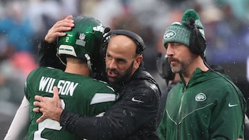 EAST RUTHERFORD, NEW JERSEY - DECEMBER 10: Head coach Robert Saleh of the New York Jets celebrates after a touchdown with Zach Wilson #2 during the third quarter in the game against the Houston Texans at MetLife Stadium on December 10, 2023 in East Rutherford, New Jersey. Al Bello/Getty Images/AFP (Photo by AL BELLO / GETTY IMAGES NORTH AMERICA / Getty Images via AFP)
