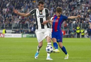 Mario Mandzukic y Sergi Roberto.