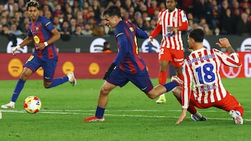 Soccer Football - Copa del Rey - Semi Final - Second Leg - FC Barcelona v Atletico Madrid - Spotify Camp Nou, Barcelona, Spain - March 3, 2026 Atletico Madrid's Marc Pubill concedes a penalty against FC Barcelona's Pedri REUTERS/Albert Gea