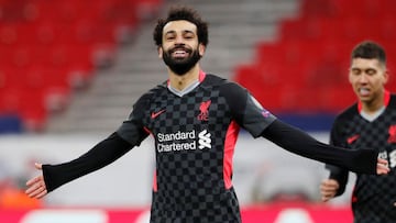 Soccer Football - Champions League - Round of 16 First Leg - RB Leipzig v Liverpool - Puskas Arena, Budapest, Hungary - February 16, 2021 Liverpool&#039;s Mohamed Salah celebrates scoring their first goal REUTERS/Bernadett Szabo     TPX IMAGES OF THE DAY