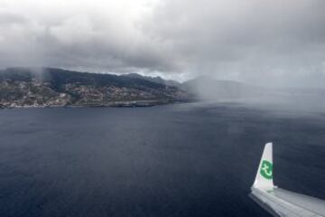 A view of the airport from inside an aeroplane.