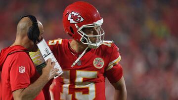 KANSAS CITY, MISSOURI - NOVEMBER 04: Offensive coordinator Matt Nagy of the Kansas City Chiefs speaks to Patrick Mahomes #15 during the fourth quarter against the Tampa Bay Buccaneers at GEHA Field at Arrowhead Stadium on November 04, 2024 in Kansas City, Missouri. David Eulitt/Getty Images/AFP (Photo by David Eulitt / GETTY IMAGES NORTH AMERICA / Getty Images via AFP)