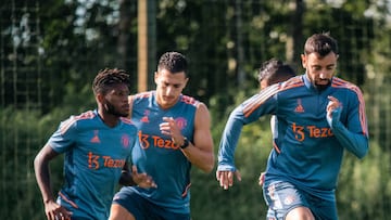 MANCHESTER, ENGLAND - AUGUST 30: (EXCLUSIVE COVERAGE) Fred, Diogo Dalot, Bruno Fernandes of Manchester United in action during a first team training session at Carrington Training Ground on August 30, 2022 in Manchester, England. (Photo by Ash Donelon/Manchester United via Getty Images)