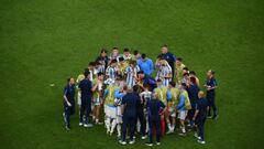 Argentina players gather together before extra time during the Qatar 2022 World Cup quarter-final football match between The Netherlands and Argentina at Lusail Stadium, north of Doha on December 9, 2022. (Photo by FRANCK FIFE / AFP) (Photo by FRANCK FIFE/AFP via Getty Images)