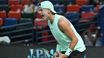 Denmark�s Holger Rune celebrates after victory against France�s Giovanni Mpetshi Perricard during their men's singles match at the Shanghai Masters tennis tournament in Shanghai on October 7, 2025. (Photo by Jade Gao / AFP)