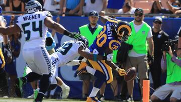 LOS ANGELES, CA - OCTOBER 08: Todd Gurley #30 of the Los Angeles Rams runs a 12-yard touchdown which was overturned and ruled a fumble that went out of bounds in the end zone during the game against the Seattle Seahawks at the Los Angeles Memorial Coliseum on October 8, 2017 in Los Angeles, California.   Sean M. Haffey/Getty Images/AFP
 == FOR NEWSPAPERS, INTERNET, TELCOS &amp; TELEVISION USE ONLY ==