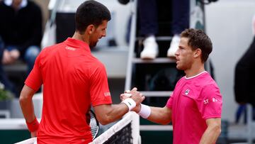 Tennis - French Open - Roland Garros, Paris, France - May 29, 2022 Serbia's Novak Djokovic with Argentina's Diego Schwartzman after winning their fourth round match REUTERS/Yves Herman