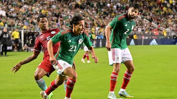 Diego Lainez drives the ball in the match against Colombia.