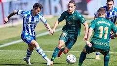 Ximo Navarro of Deportivo Alaves and Jaime Seoane of SD Huesca during the Spanish league, La Liga Santander, football match played between Deportivo Alaves and SD Huesca at Mendizorroza stadium on April 18, 2021 in Vitoria, Spain.
 AFP7 
 18/04/2021 ONLY 