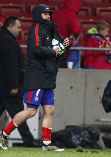 I'll get the lads to sign it later: Griezmann with the match ball