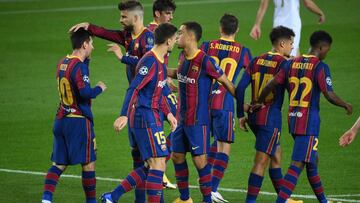 Barcelona&#039;s Argentine forward Lionel Messi (L) celebrates with teammates after scoring a penalty during the UEFA Champions League football match between FC Barcelona and Ferencvarosi TC at the Camp Nou stadium in Barcelona on October 20, 2020. (Photo