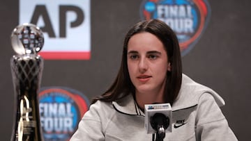 CLEVELAND, OHIO - APRIL 04: Caitlin Clark #22 of the Iowa Hawkeyes speaks after accepting the AP Player of the Year Award ahead of the 2024 NCAA Women's Basketball Tournament Final Four at Rocket Mortgage Fieldhouse on April 04, 2024 in Cleveland, Ohio.   Gregory Shamus/Getty Images/AFP (Photo by Gregory Shamus / GETTY IMAGES NORTH AMERICA / Getty Images via AFP)