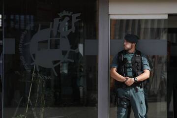 A Spanish Civil Guard stands guard during a raid at the Spanish Soccer Federation headquarters in Las Rozas, outside Madrid, Spain, July 18, 2017.