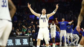 LOS ANGELES, CALIFORNIA - NOVEMBER 23: Luka Doncic #77 of the Dallas Mavericks reacts during the second half of a game against the LA Clippers at Staples Center on November 23, 2021 in Los Angeles, California. NOTE TO USER: User expressly acknowledges and agrees that, by downloading and/or using this photograph, User is consenting to the terms and conditions of the Getty Images License Agreement.   Sean M. Haffey/Getty Images/AFP
 == FOR NEWSPAPERS, INTERNET, TELCOS &amp; TELEVISION USE ONLY ==