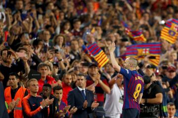 Andres Iniesta walks off the pitch. Iniesta, who joined Barcelona's academy 22 years ago, played his final game for the club.