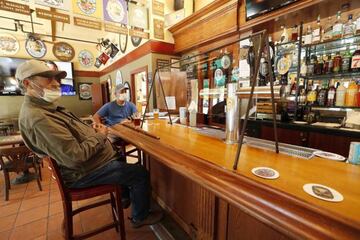 Customers sit at a bar during Napa County's and the state's Phase 2 reopening for dine-in customers in downtown Napa, California, USA, 21 May 2020.