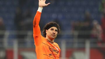 MILAN, ITALY - MARCH 13: Guillermo Ochoa of Salernitana shows appreciation to fans following the Serie A match between AC Milan and Salernitana at Stadio Giuseppe Meazza on March 13, 2023 in Milan, Italy. (Photo by Marco Luzzani/Getty Images)